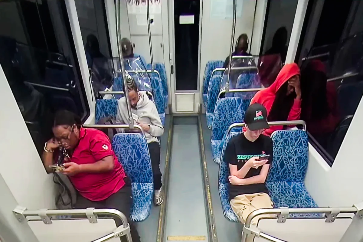 Iryna Zarutska (bottom R) before she was fatally stabbed on a commuter train on Aug. 22, 2025, in a still from video. (Charlotte Area Transit System via AP)