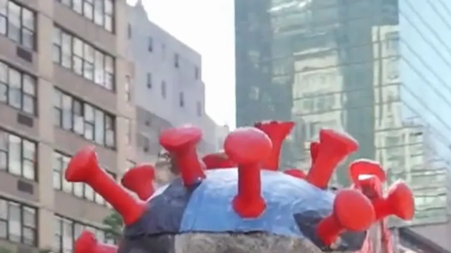 Anti-CCP Activists Parade Virus-Themed Float Outside UN Headquarters | NTD