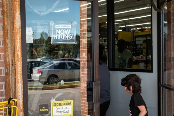 Now hiring sign at a store in Norfolk, Va., on Oct. 5, 2025. (Madalina Kilroy/The Epoch Times)