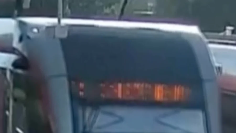 Moment: Security Guard Pulls Woman From Path of Oncoming Tram