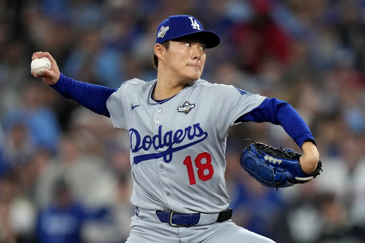 Los Angeles Dodgers pitcher Yoshinobu Yamamoto delivers during the sixth inning in Game 2 of MLB's World Series against the Toronto Blue Jays, in Toronto on Oct. 25, 2025. (Nathan Denette/The Canadian Press via AP)