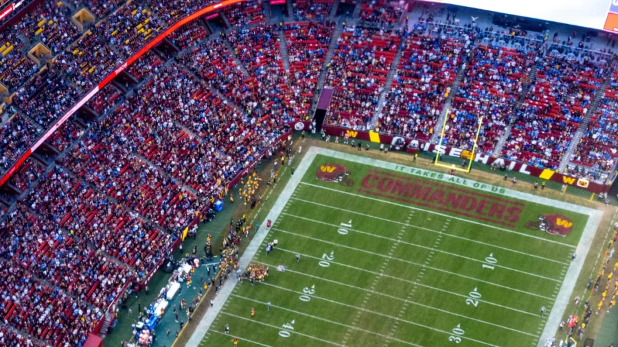 Air Force One, With Trump Aboard, Flies Over Football Stadium