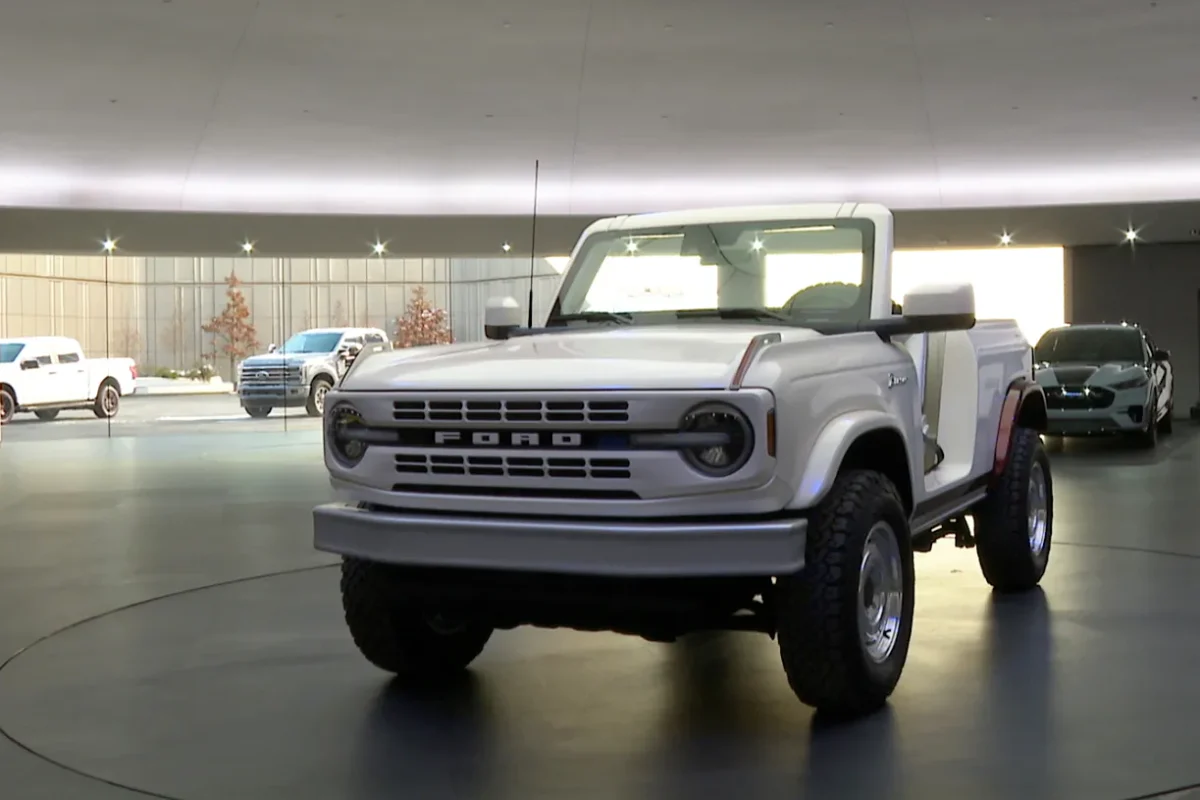 A Bronco concept vehicle is parked in the showroom inside Ford Motor Co.'s new headquarters building in Dearborn, Mich., on Nov. 10, 2025, in a still from video. (Mike Householder/AP Photo)