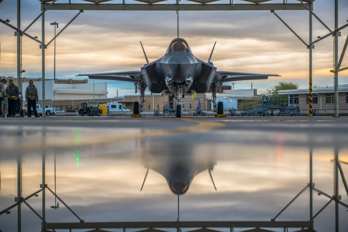 A pilot assigned to the 61st Fighter Squadron and 61st Aircraft Maintenance Unit crew chiefs prepare an F-35A Lightning II for taxi at Luke Air Force Base, Ariz., on Jan. 15, 2019. (Airman 1st Class Jacob Wongwai/U.S Air Force)