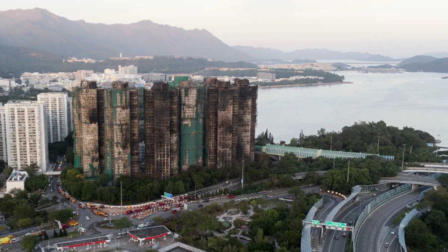 8 More Arrested Over Hong Kong Towers Fire