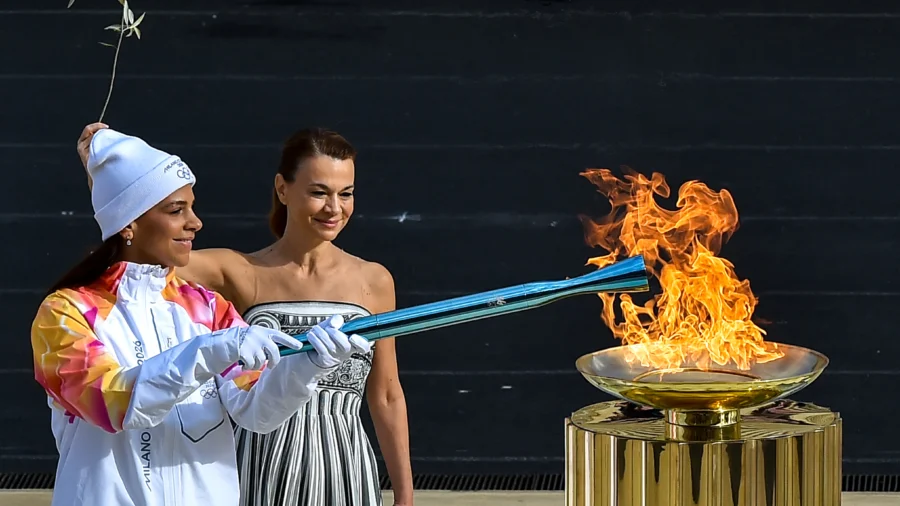 Italy Welcomes Olympic Flame Ahead of Winter Games