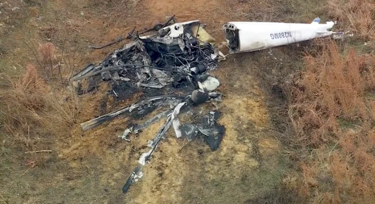 Debris from a helicopter is shown after two helicopters crashed in Hammonton, N.J., on Dec. 28, 2025. (WPVI-TV/6ABC via AP)