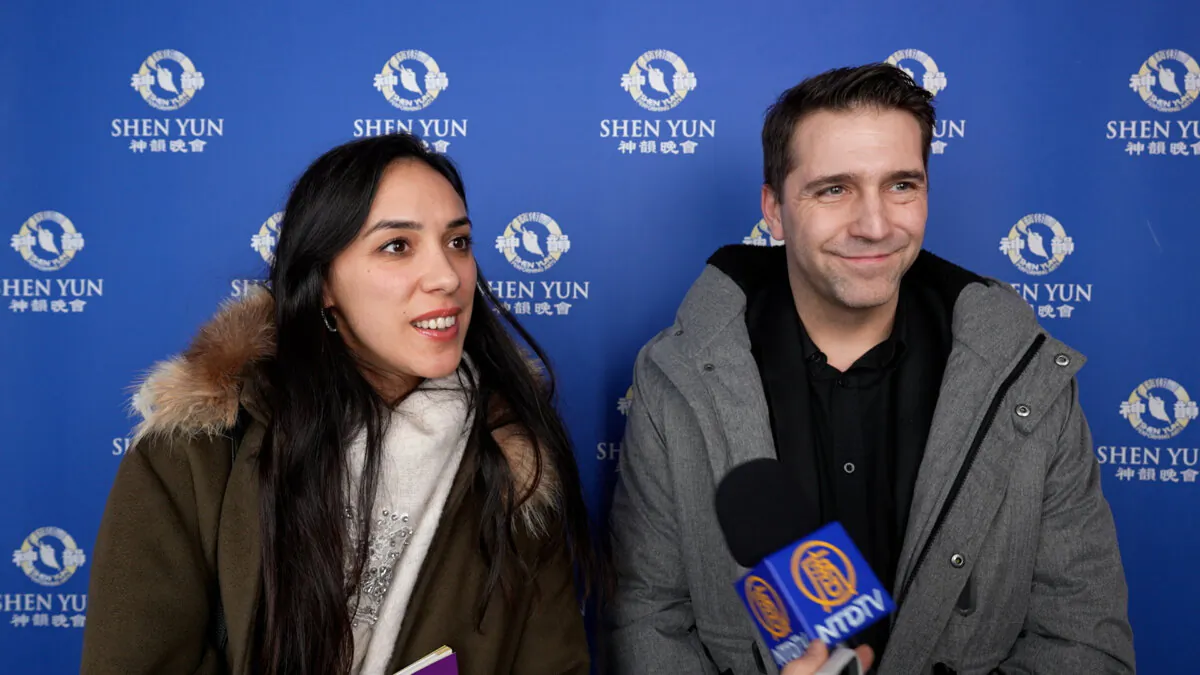 Benoît and Mélanie Baron, coffee roaster and beauty salon manager, attend Shen Yun in Rouen on Jan. 12, 2026. (NTD)