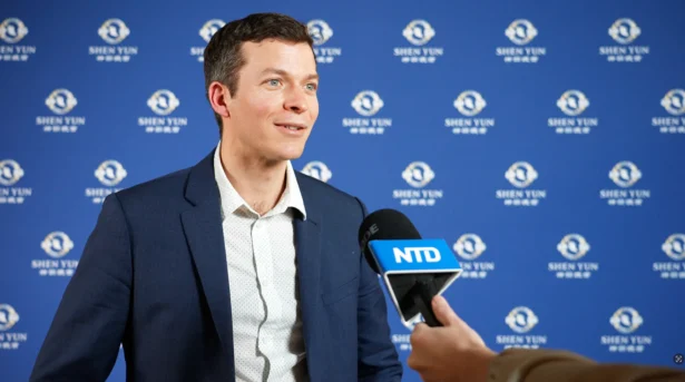 Photographer Jacques Quentin at the Shen Yun performance at the Geneva Arena on Jan. 21, 2026. (NTD)