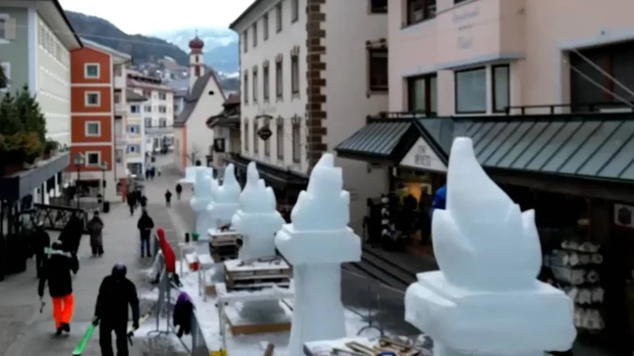 Artists Carve Olympic Flame and Rings Out of Ice on Italian Alps