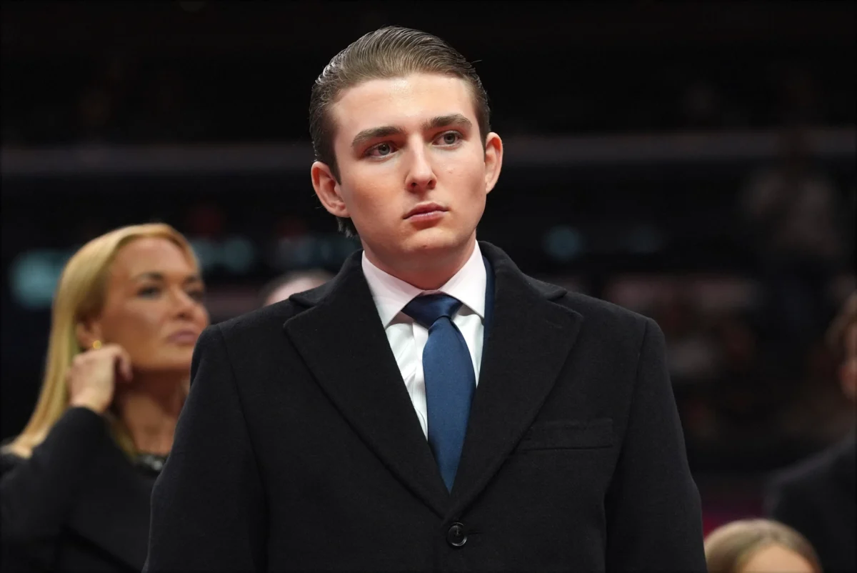 Barron Trump watches as his father, President Donald Trump attends an indoor Presidential Inauguration parade event at Capital One Arena, in Washington on Jan. 20, 2025. (Evan Vucci/AP Photo)