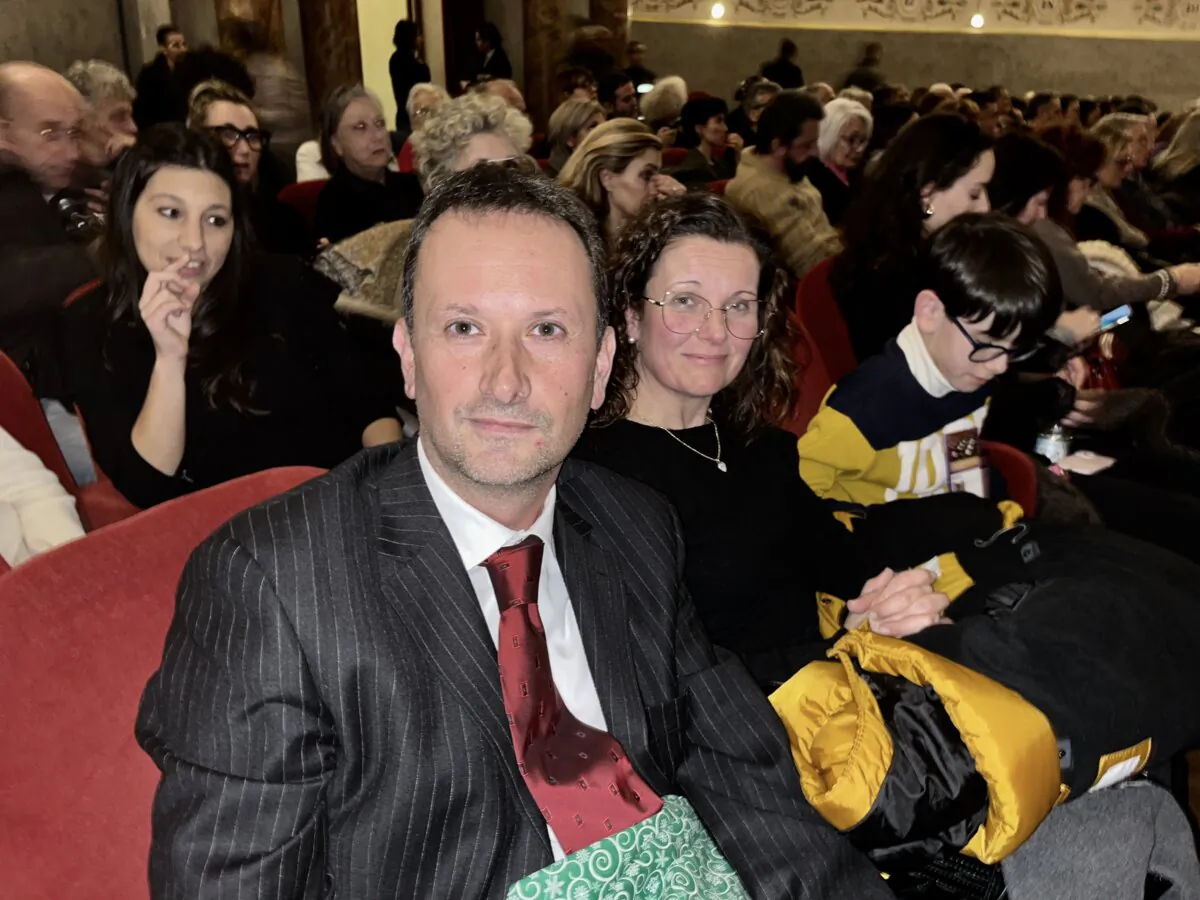 Luca Andreini, manager of a public health organization, attends the second performance of Shen Yun New York Company at Teatro Goldoni with family members on Jan. 28, 2026. (Leo Botnarenko/The Epoch Times)