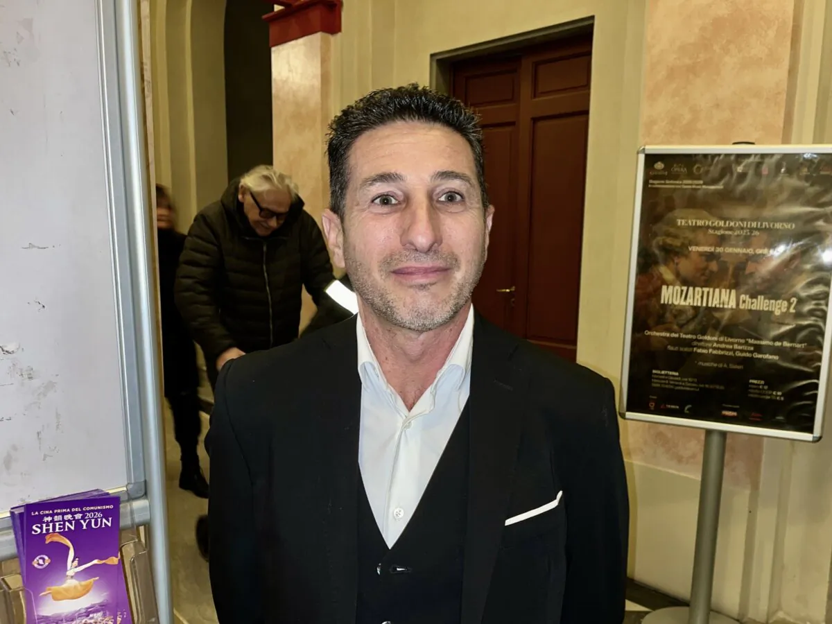 Real estate manager Riccardo Misale and his wife attend the second show of Shen Yun Performing Arts at the Teatro Goldoni in Livorno, Italy, on Jan. 28, 2026. (Leo Botnarenko/The Epoch Times)
