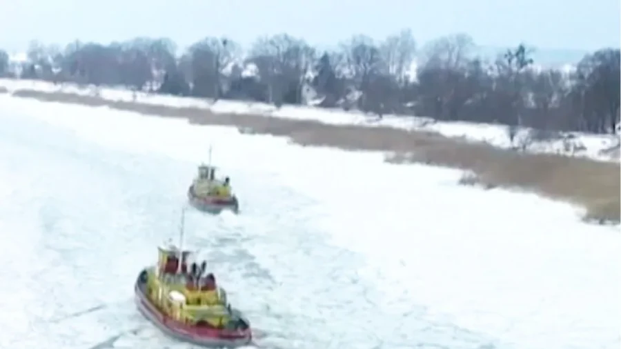 Drone Footage Shows Icebreakers Cutting Through Ice on Polish River