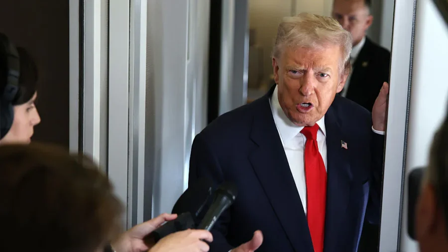 Trump Speaks With Reporters Aboard Air Force One