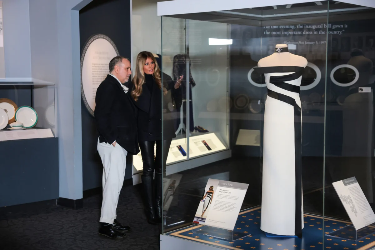 First Lady Melania Trump and fashion designer Herve Pierre view her second inaugural dress during an event at the Smithsonian National Museum of American History in Washington on Feb. 20, 2026. (Anna Moneymaker/Getty Images)
