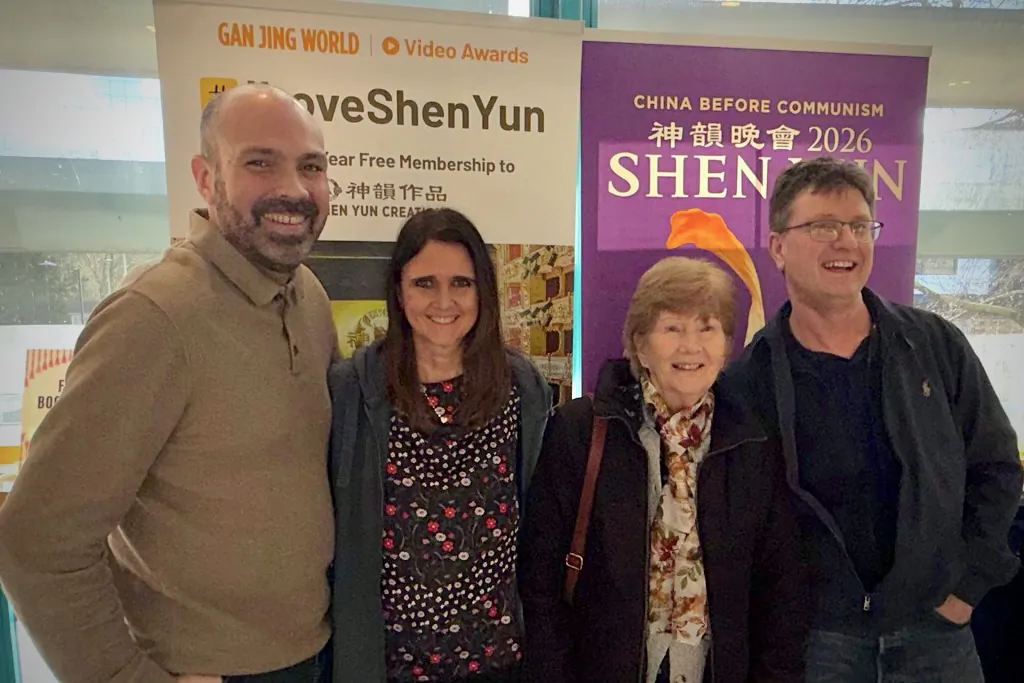 Darren Grattan (R) and Ian Cox (L) and their family members enjoyed Shen Yun Performing Arts at the Wycombe Swan Theatre in the UK on Feb. 28, 2026. (James Xu/The Epoch Times)