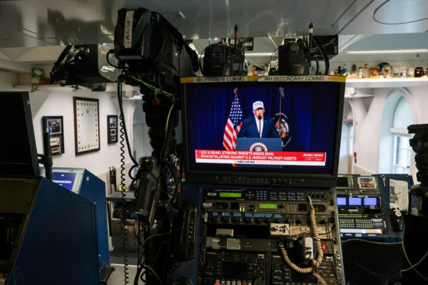 An NBC News live feed airs a clip from President Donald Trump’s Truth Social video announcement in the White House James S. Brady Press Briefing Room in Washington, DC, on Feb. 28, 2026. (Anna Moneymaker/Getty Images)