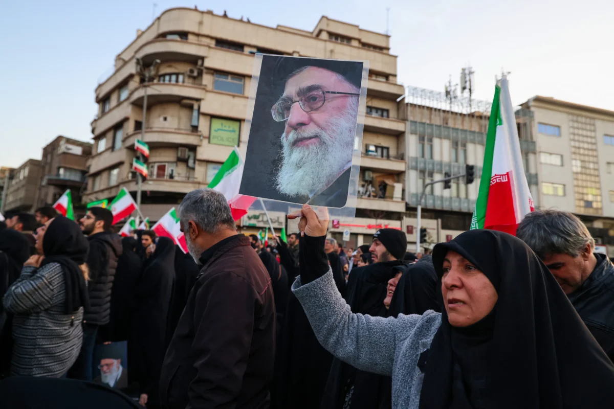 Pro-regime demonstrators gather at a square to mourn the death of Iran’s leader Ali Khamenei in Tehran on March 1, 2026. (Atta Kenare/AFP via Getty Images)
