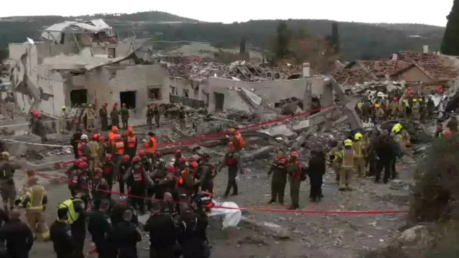 Israeli Security, Rescue Teams at Site Where a Home Was Hit During an Iranian Rocket Attack