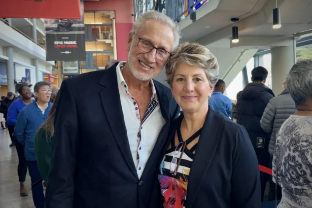 Laureen Schumann attends Shen Yun with her husband, Ralph, at the Living Arts Centre in Mississauga on March 14, 2026. (Xinxin Teng/The Epoch Times)