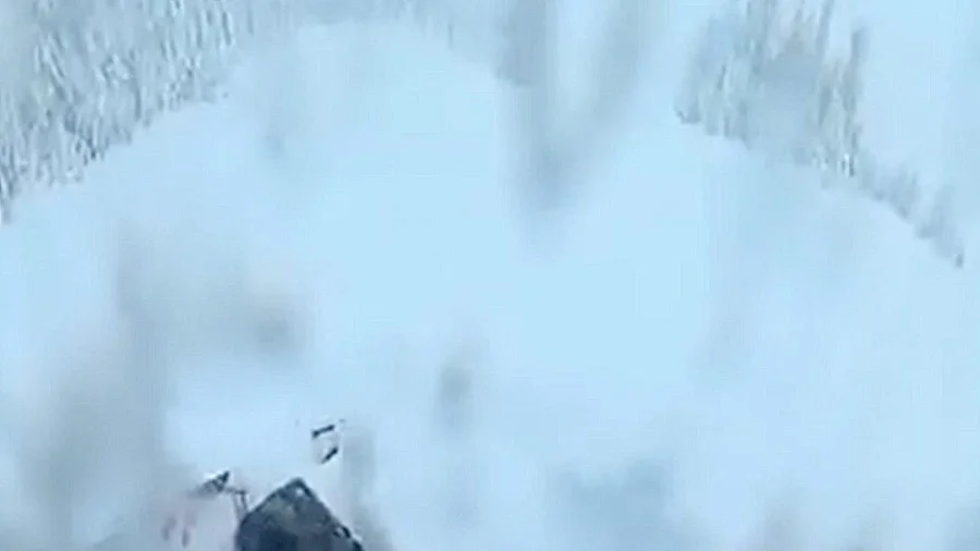 Skier Rescued After Getting Stuck Upside Down in Deep Snow