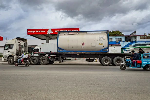 A truck belonging to a private Cuban company remains parked in front of a gas station with an IsoTank of imported fuel in Havana on March 19, 2026. The Cuban regime has allowed private small and medium-sized enterprises to source fuel via state importers to ease shortages, after Venezuelan and Mexican supplies dried up, and as the United States moved to license resales to Cuba's private sector. (Adalberto Roque/AFP via Getty Images)