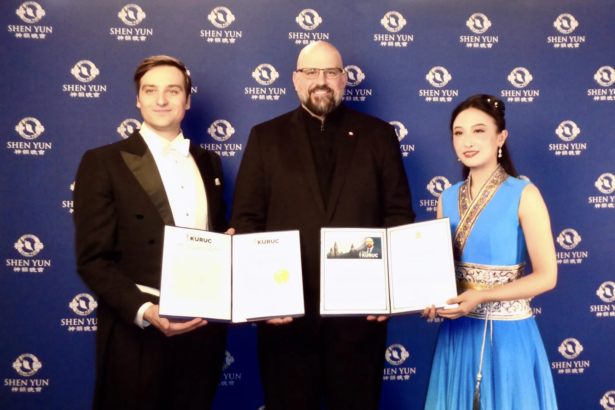 Conservative MP Ned Kuruc (C) with Shen Yun Performing Arts hosts as he attends a Shen Yun performance at the FirstOntario Concert Hall in Hamilton, Ont., on March 12, 2026. (NTD)