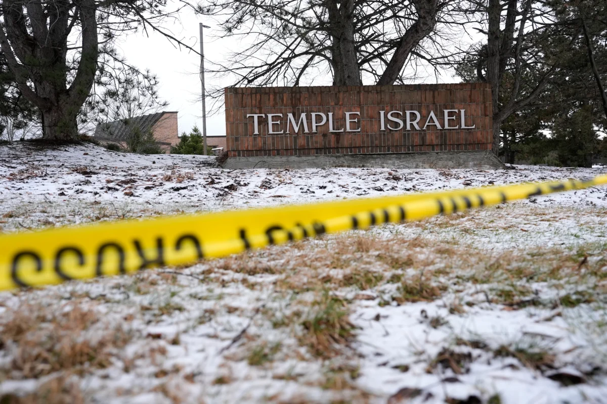 Police tape hangs outside the Temple Israel synagogue in West Bloomfield Township, Mich., on March 13, 2026. (Paul Sancya/AP Photo)