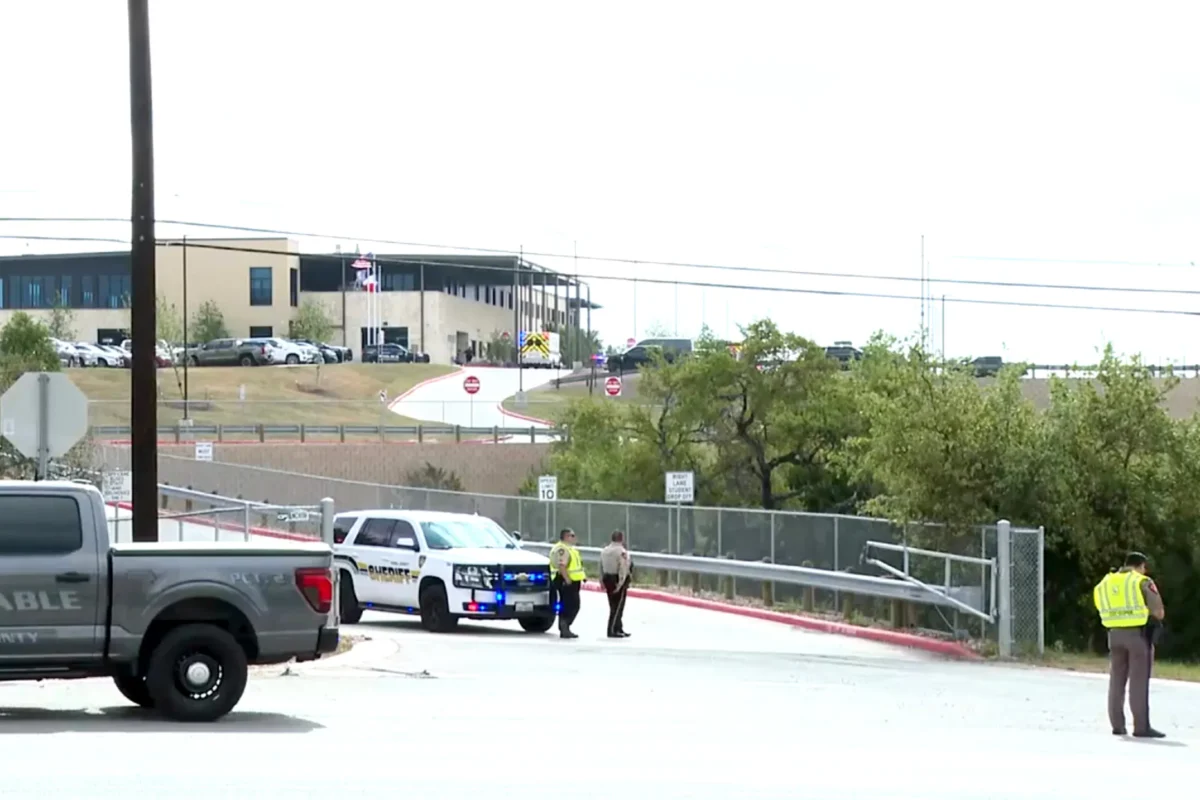 First responders outside after a student shot a teacher at Hill Country College Preparatory High School in Bulverde, Texas, on March 30, 2026, in a still from video. (KSAT via AP)