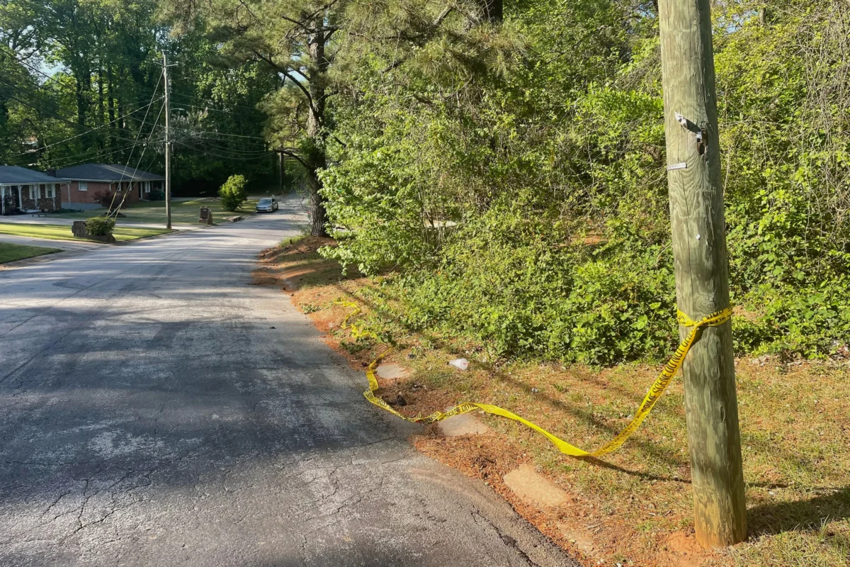 Crime scene tape is tied around a pole near the site where Lauren Bullis was killed, in Panthersville, Ga., on April 15, 2026. (R.J. Rico/AP Photo)