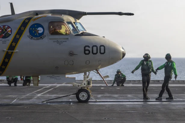 U.S. Sailors prepare to launch an E-2D Hawkeye, attached to Airborne Command & Control Squadron (VAW) 117, on the flight deck of Nimitz-class aircraft carrier USS Abraham Lincoln (CVN 72) during Operation Epic Fury, March. 14, 2026. (Courtesy of the U.S. Navy)