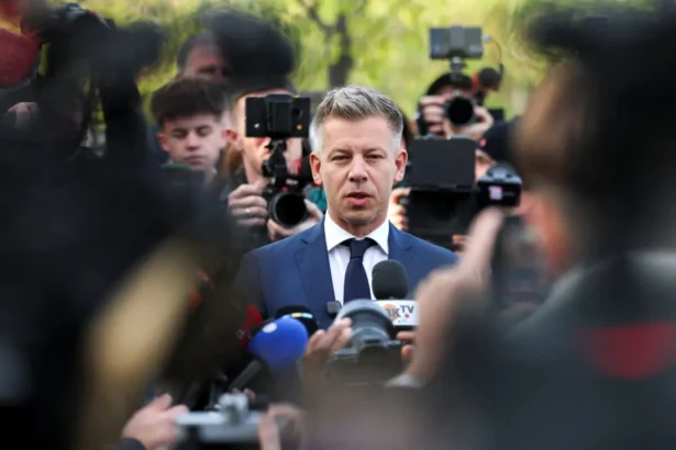 Peter Magyar, leader of the opposition Tisza party, speaks to reporters after voting during the Hungarian parliamentary election in Budapest, Hungary, on April 12, 2026. (Leonhard Foeger/Reuters)