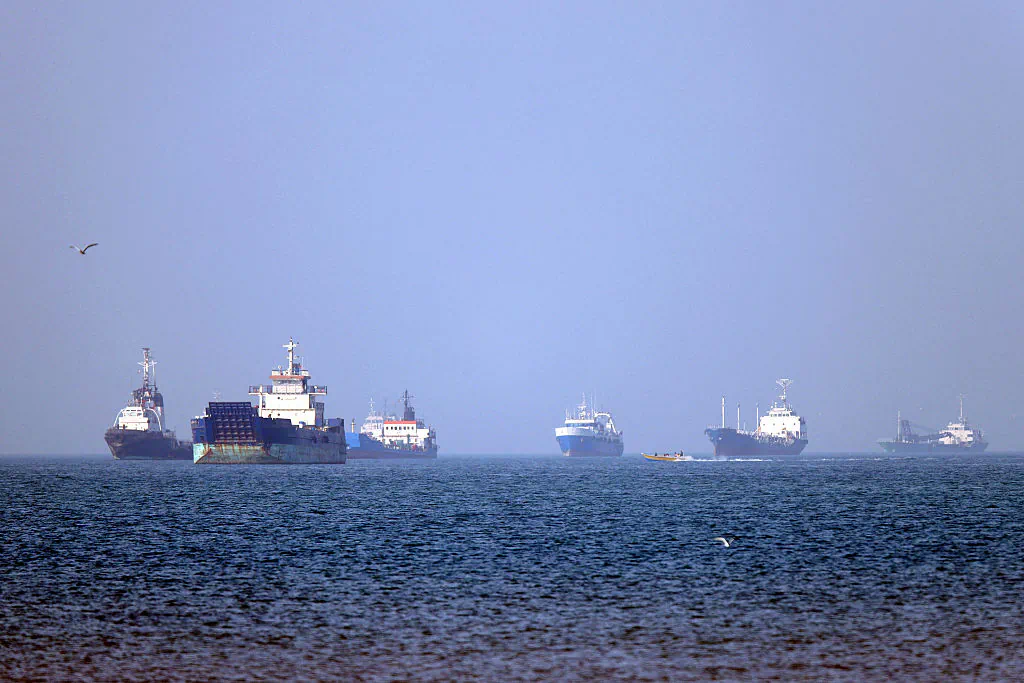 In this picture obtained from Iran's ISNA news agency on May 4, 2026, vessels are pictured anchored in the Strait of Hormuz off Bandar Abbas in southern Iran. (Amirhossein Khorgooei/ISNA/AFP via Getty Images)