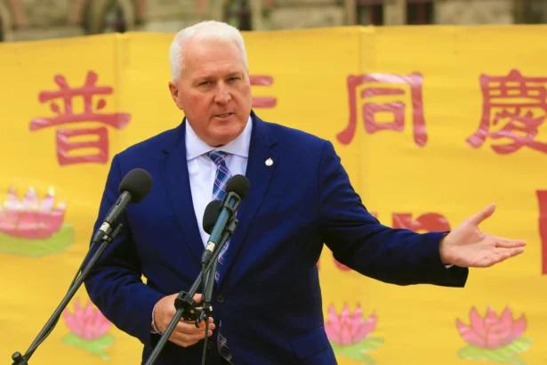 Conservative MP John Brassard celebrates World Falun Dafa Day on Parliament Hill in Ottawa on May 5, 2026. (Jonathan Ren/The Epoch Times)