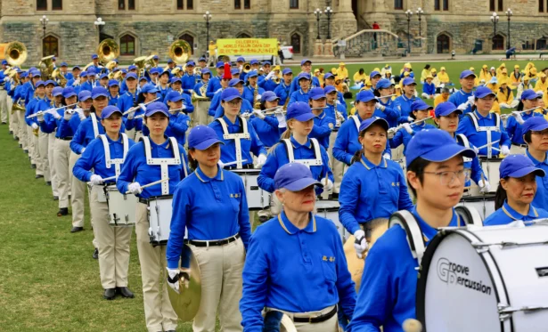 The Tian Guo Marching Band performs as part of activities to celebrate World Falun Dafa Day on Parliament Hill in Ottawa on May 5, 2026. (Jonathan Ren/The Epoch Times)