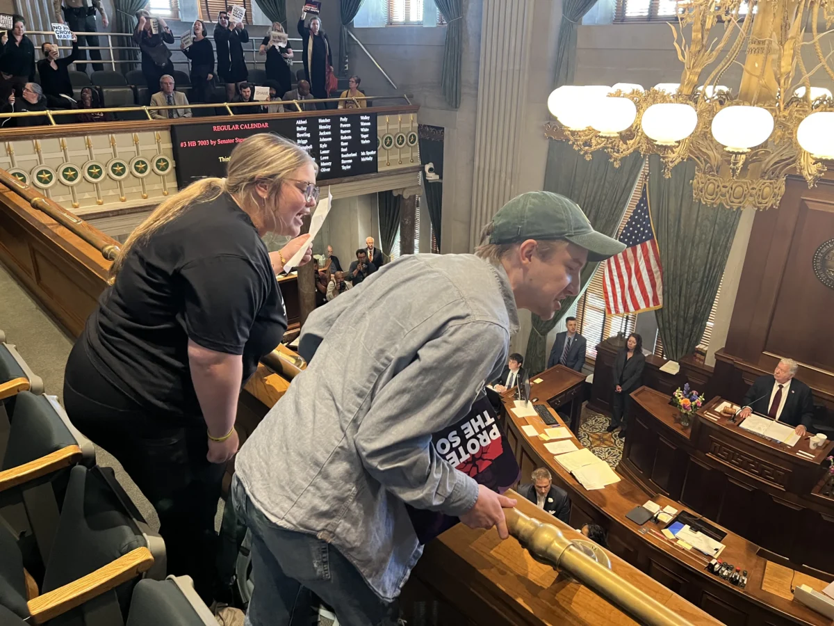 Protesters shout at state senators as they prepare to vote on the new congressional map during a special session in Nashville on May 7, 2026. (Jacki Thrapp/The Epoch Times)