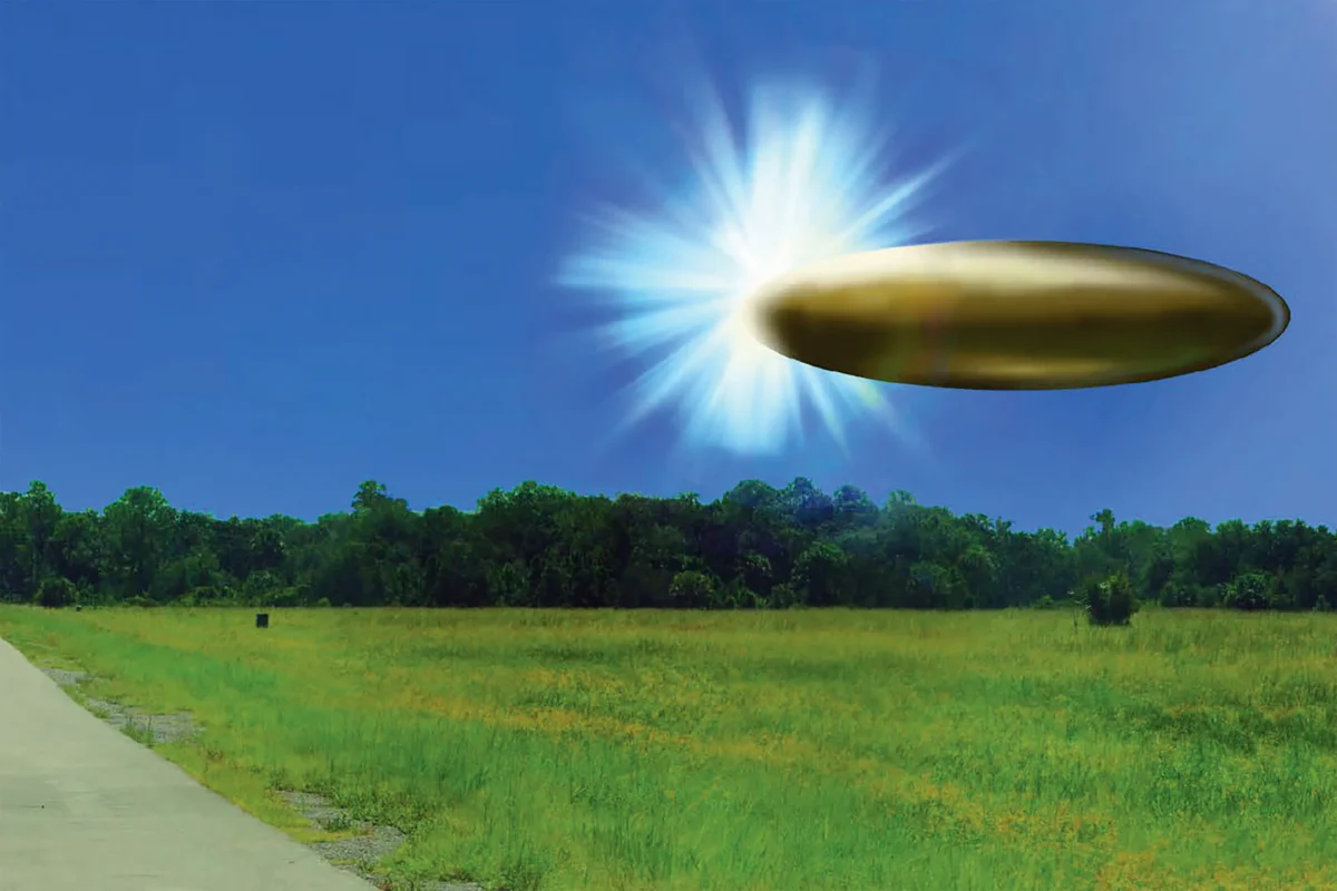 In this handout image provided by the Department of War, an actual site photo with FBI Lab rendered graphic overlay depicting corroborating eyewitness reports from September 2023 of an apparent ellipsoid bronze metallic object materializing out of a bright light in the sky, 130-195 feet in length, and disappearing instantaneously. (US Department of War via Getty Images)