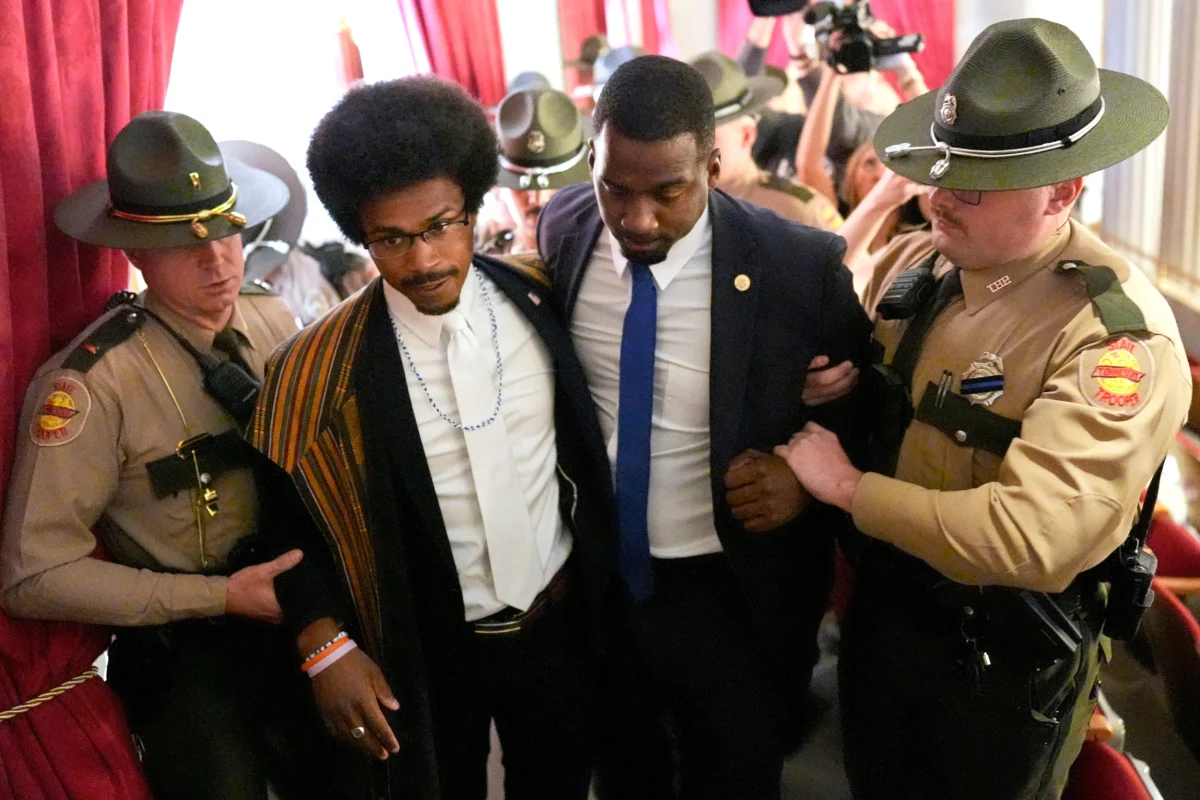Rep. Justin J. Pearson (D-Memphis) (2nd L) walks with his brother KeShaun Pearson, as he is arrested and removed from the House gallery during a special session of the state legislature to redraw U.S. Congressional voting maps in Nashville, Tenn., on May 7, 2026. (George Walker IV/AP Photo)