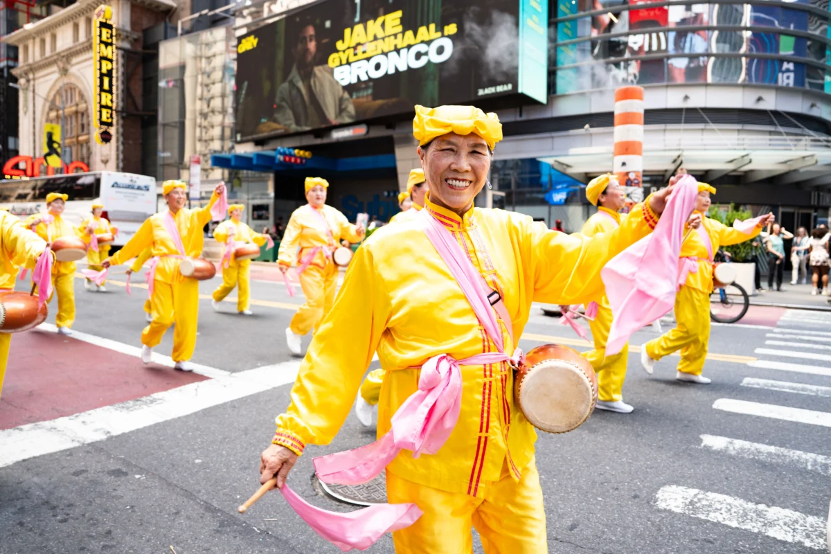Falun Gong practitioners take part in a parade to celebrate World Falun Dafa Day and call for an end to persecution in China, in New York City, on May 13, 2026. (Samira Bouaou/The Epoch Times)