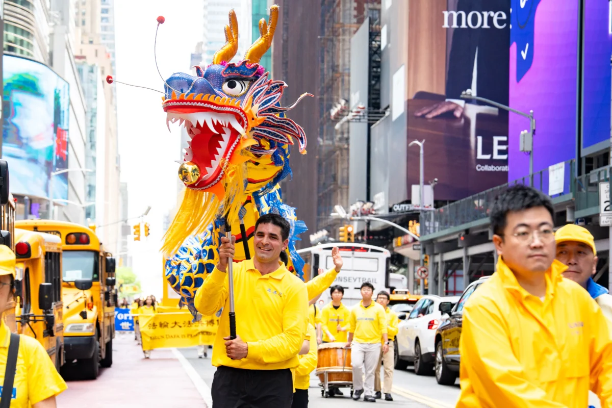 Falun Gong practitioners take part in a parade to celebrate World Falun Dafa Day and call for an end to persecution in China, in New York City, on May 13, 2026. (Samira Bouaou/The Epoch Times)