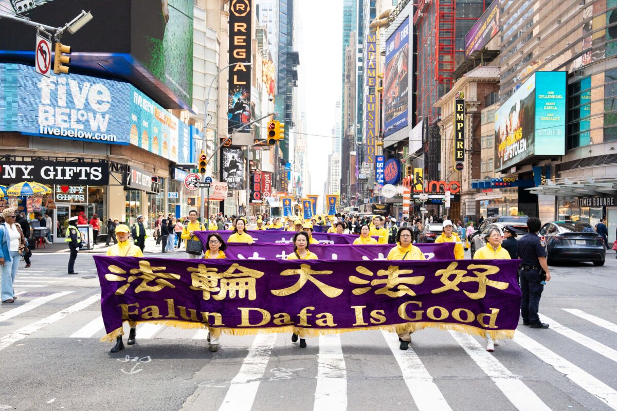 Falun Gong practitioners take part in a parade to celebrate World Falun Dafa Day and call for an end to persecution in China, in New York City, on May 13, 2026. (Samira Bouaou/The Epoch Times)