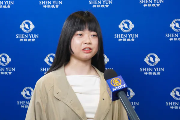 Ms. Bai, a Chinese tourist visiting Tokyo, attends Shen Yun Performing Arts at the Tokyo International Forum on the afternoon of May 13, 2026. (Lu Yong/The Epoch Times)