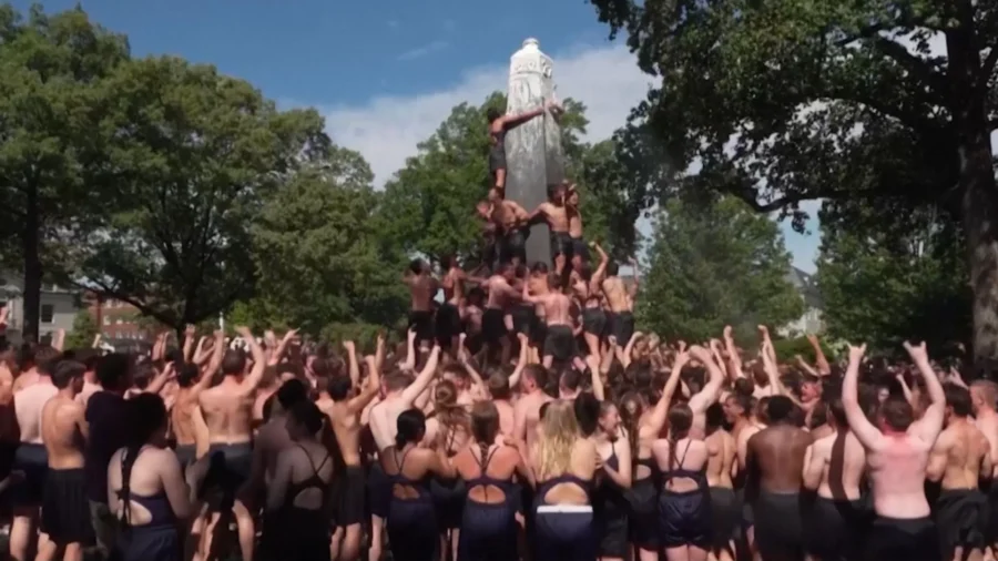NJ Governor's Son Leads US Naval Academy Students to Top of Greased Obelisk in Annual Ritual