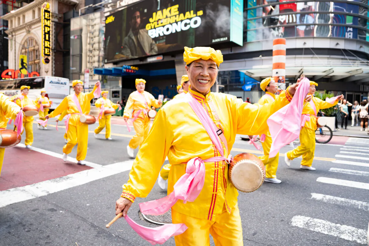 Falun Gong practitioners take part in a parade to celebrate World Falun Dafa Day and call for an end to persecution in China, in New York City, on May 13, 2026. (Samira Bouaou/The Epoch Times)
