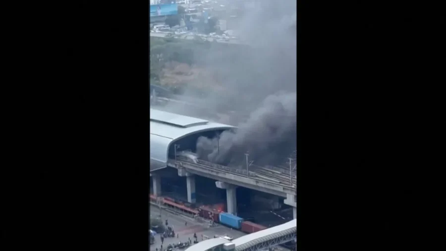 Smoke Cloud Rises From Central Bangkok's Airport Rail Link Station After Cargo Train Hits Public Bus