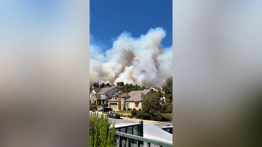 Fire Crews Battle California Wildfire as Thousands Ordered to Evacuate, Schools Canceled