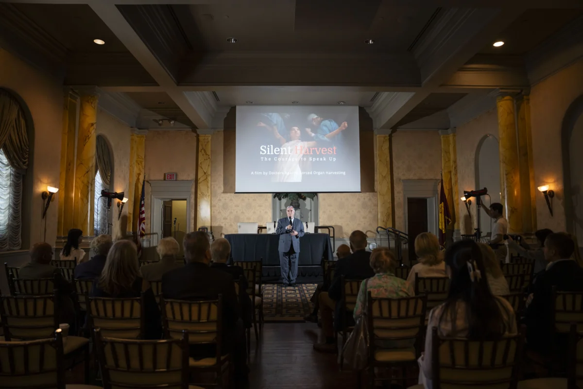 Torsten Trey founder and executive director of Doctors Against Forced Organ Harvesting speaks during the screening of the documentary “Silent Harvest: The Courage to Speak Up,” in Washington on May 16, 2026. (Madalina Kilroy/The Epoch Times)