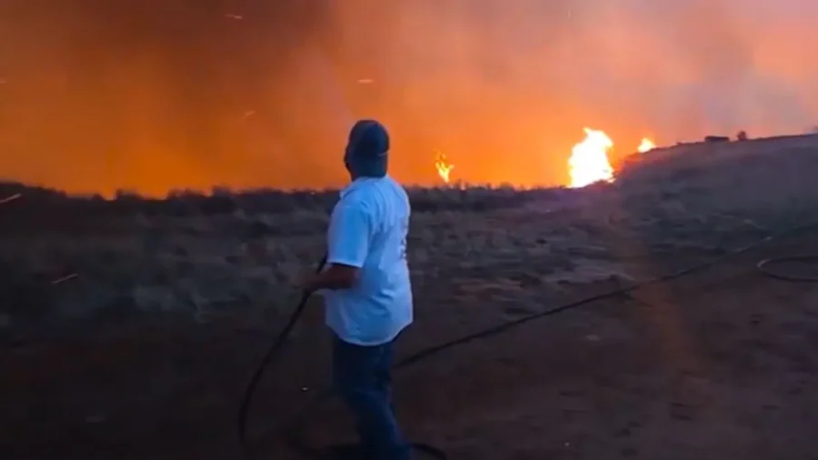 Neighbors Form Bucket Brigade to Fight California Wildfire