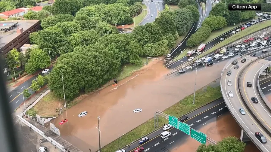 Cars Stuck Around Atlanta as Heavy Rainfall Floods Interstate